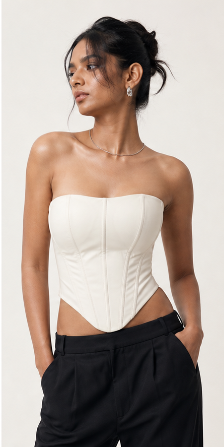A structured corset top that keeps the drama clean.