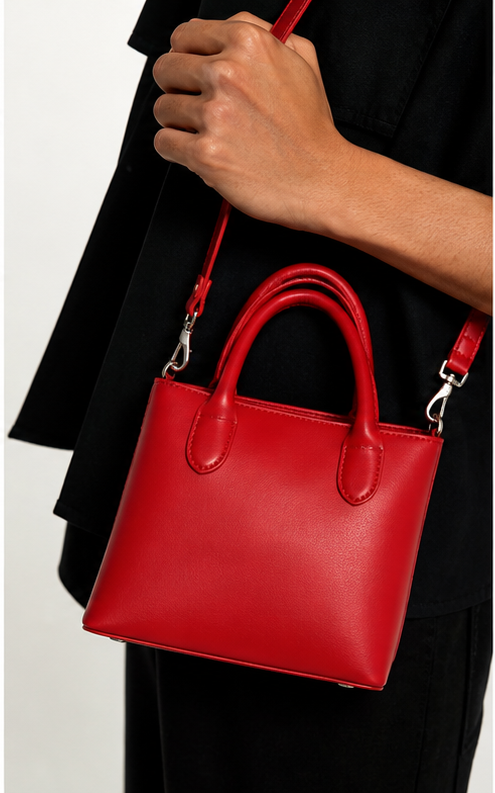 A red mini tote that does not pretend to be neutral.